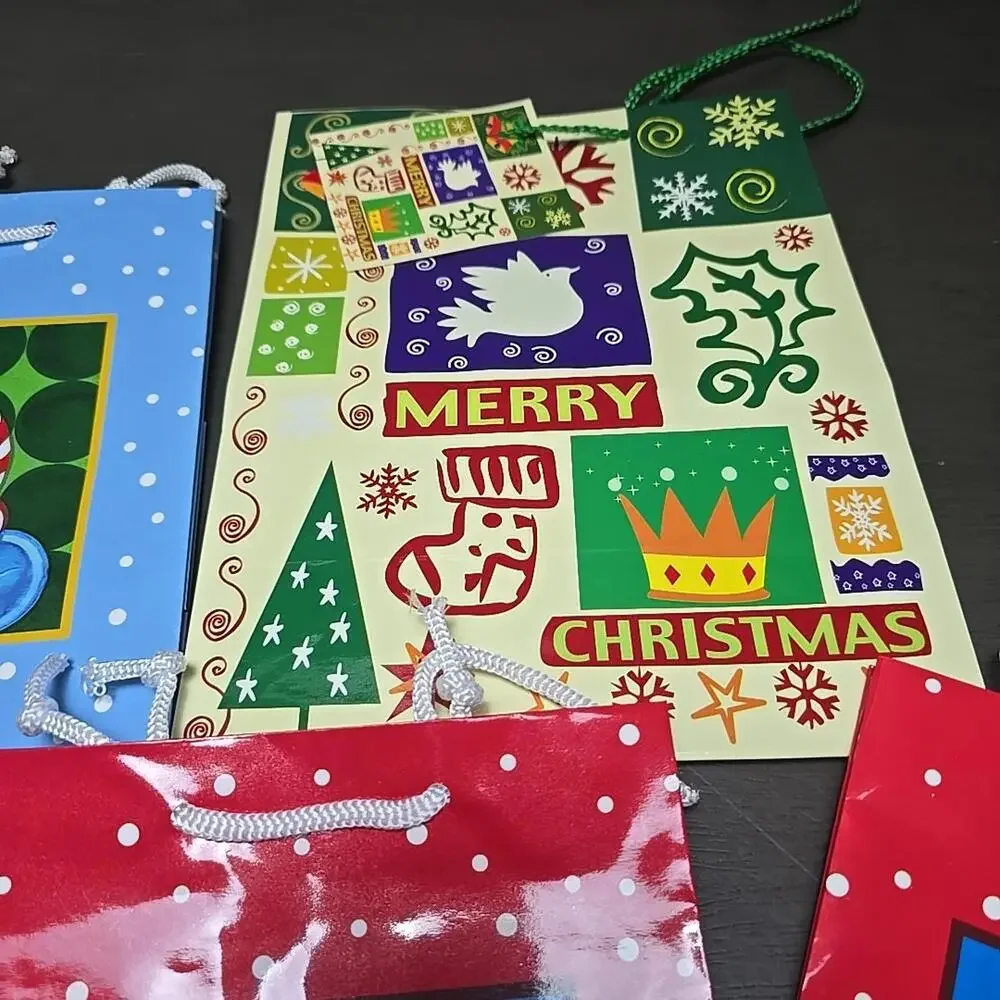 Lof of 8 Christmas Gift Bags for Presents